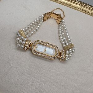 AVON X ELIZABETH TAYLOR 'Evening Star' Watch